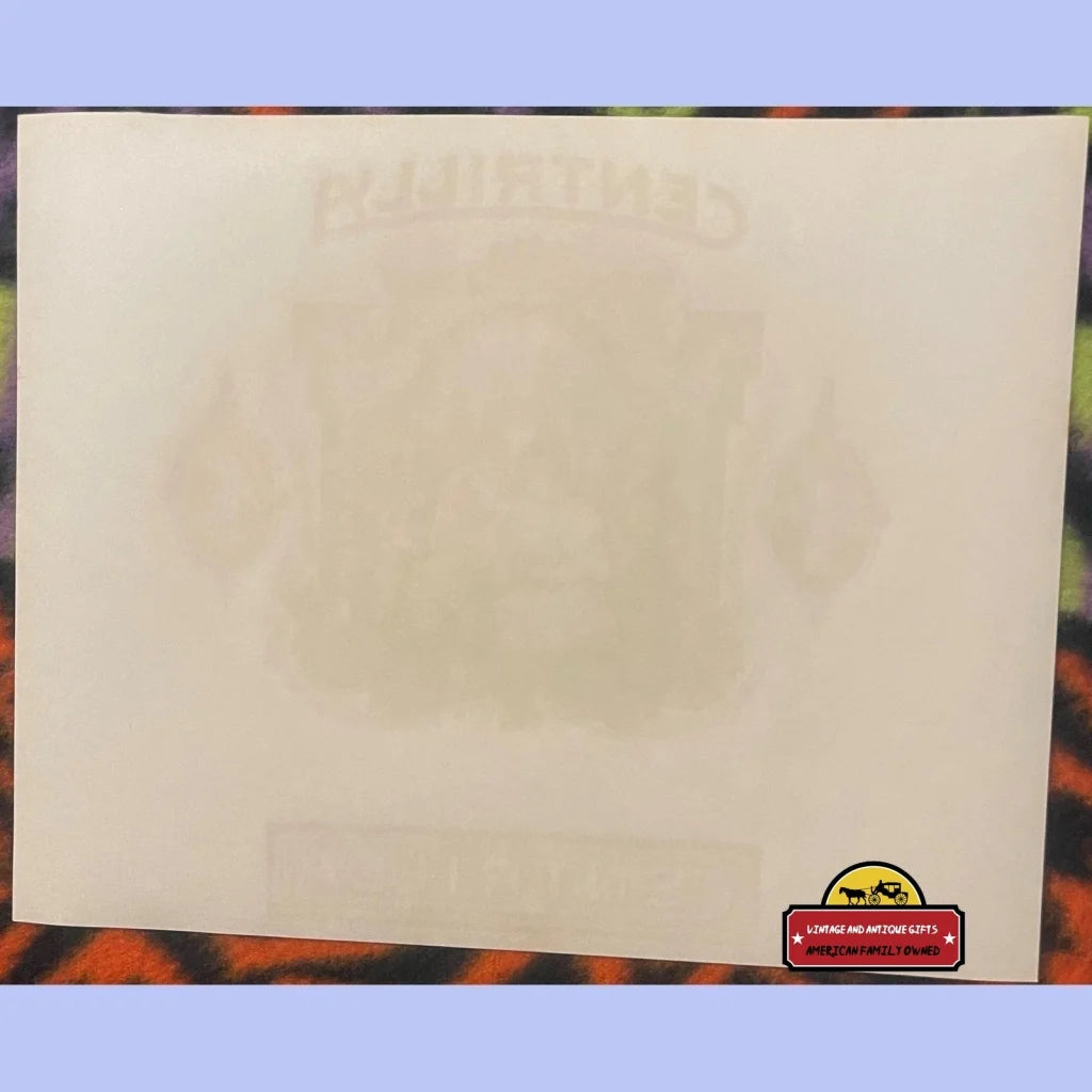 Blank beige notepad featuring a cartoon character and a Centrilla embossed cigar logo