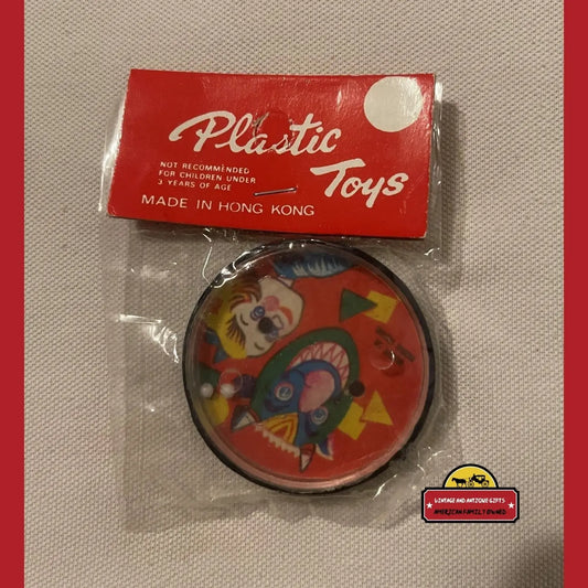 Vintage plastic toy in packaging showcasing the rich history of vintage toys for Black Friday deals