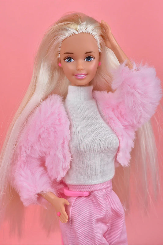 Blonde Barbie doll in pink outfit for 90s video games article about innovative gameplay