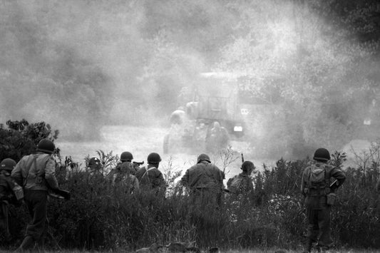 US soldiers with tank amid smoke after Pearl Harbor in World War II