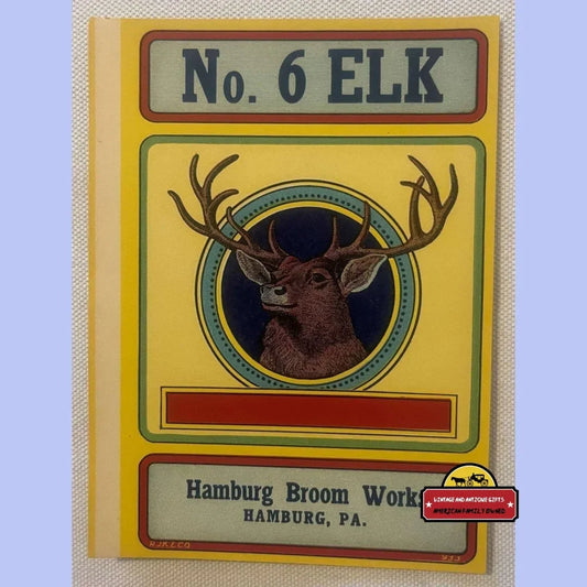Yellow chromolithograph broom label with elk head medallion, marked No. 6 Elk, Hamburg Broom Works, Hamburg Pennsylvania, 1920s.