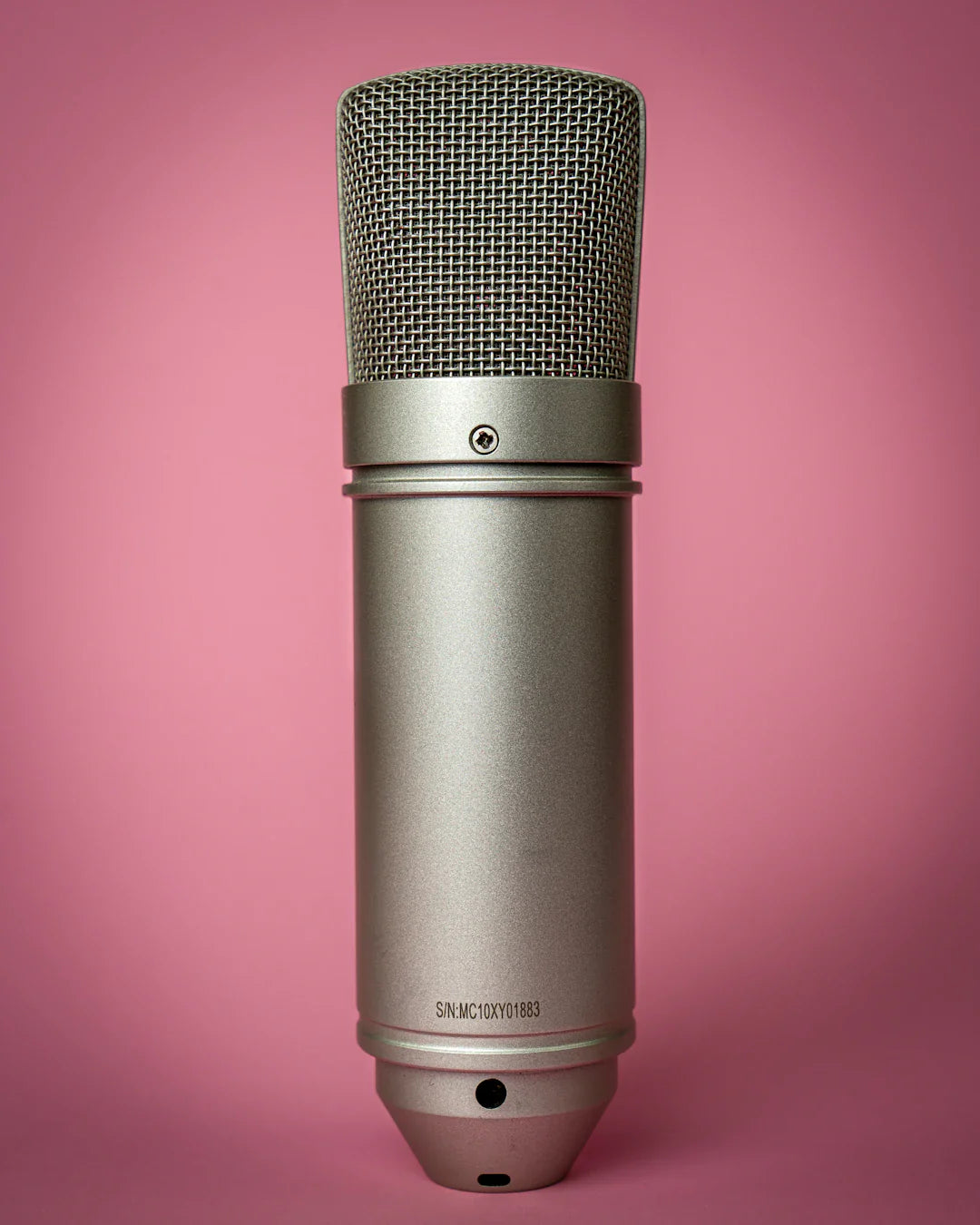 Silver condenser microphone with mesh grille for establishing your unique brand voice