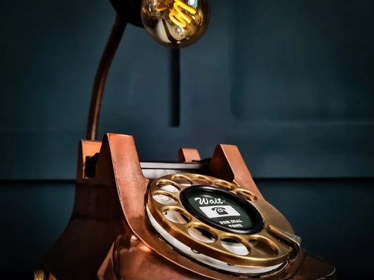 Copper-colored rotary phone lamp adds vintage americana elements to your americana home decor
