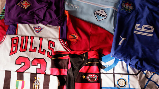 Assorted signed jerseys including Tom Brady, signed McCoy, and custom jersey.