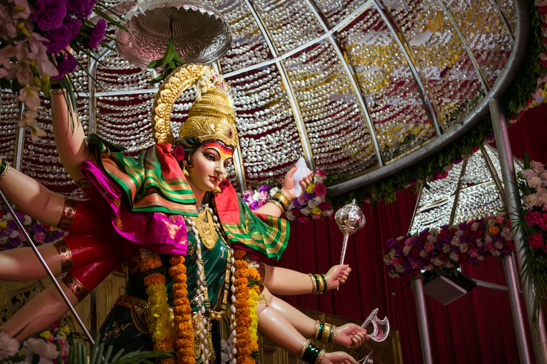 Vivid rave fashion inspired Durga idol with multiple arms and traditional jewelry