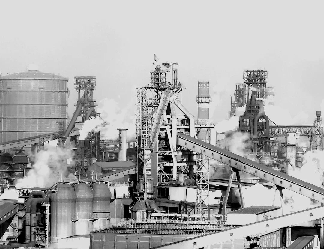 Industrial steel mill with blast furnaces and conveyor belts for American industry insights
