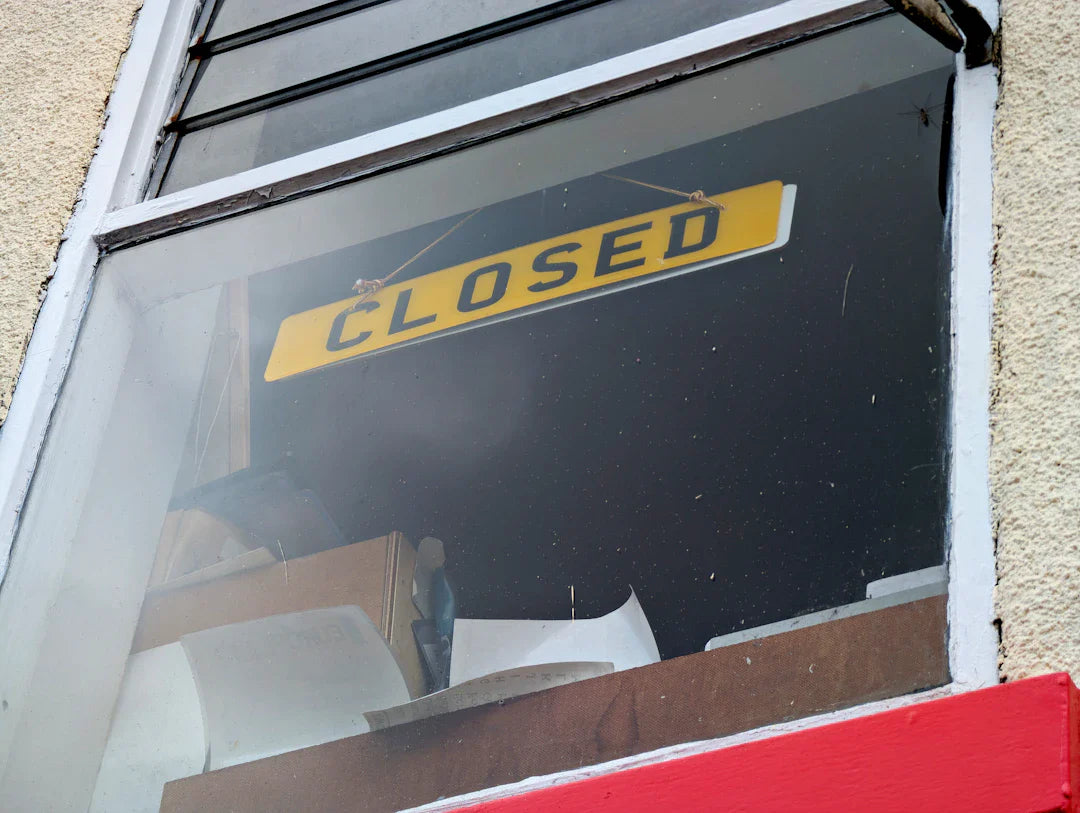 Closed sign in window during Great Depression bank failures