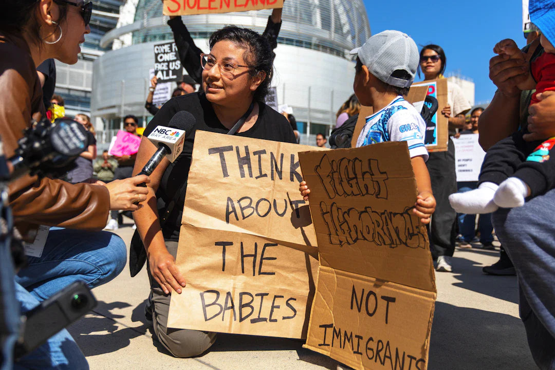 Protest sign in modern American history: think about the babies