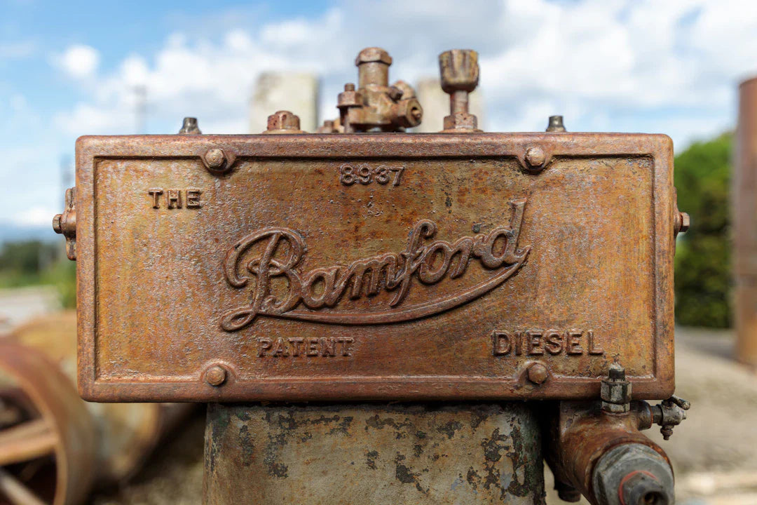 Rusty vintage Bamford diesel engine showcasing key innovations of the industrial revolution