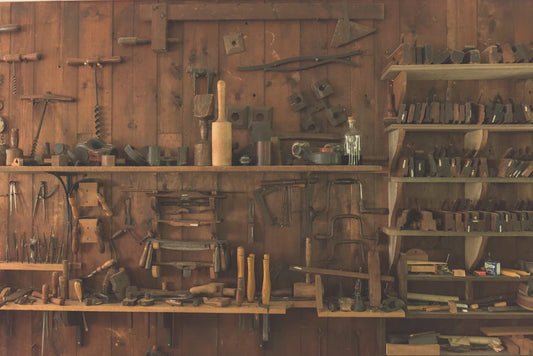 Workshop with hand tools, symbolizing leaders like Frederick Douglass and Thaddeus Stevens during Reconstruction Acts