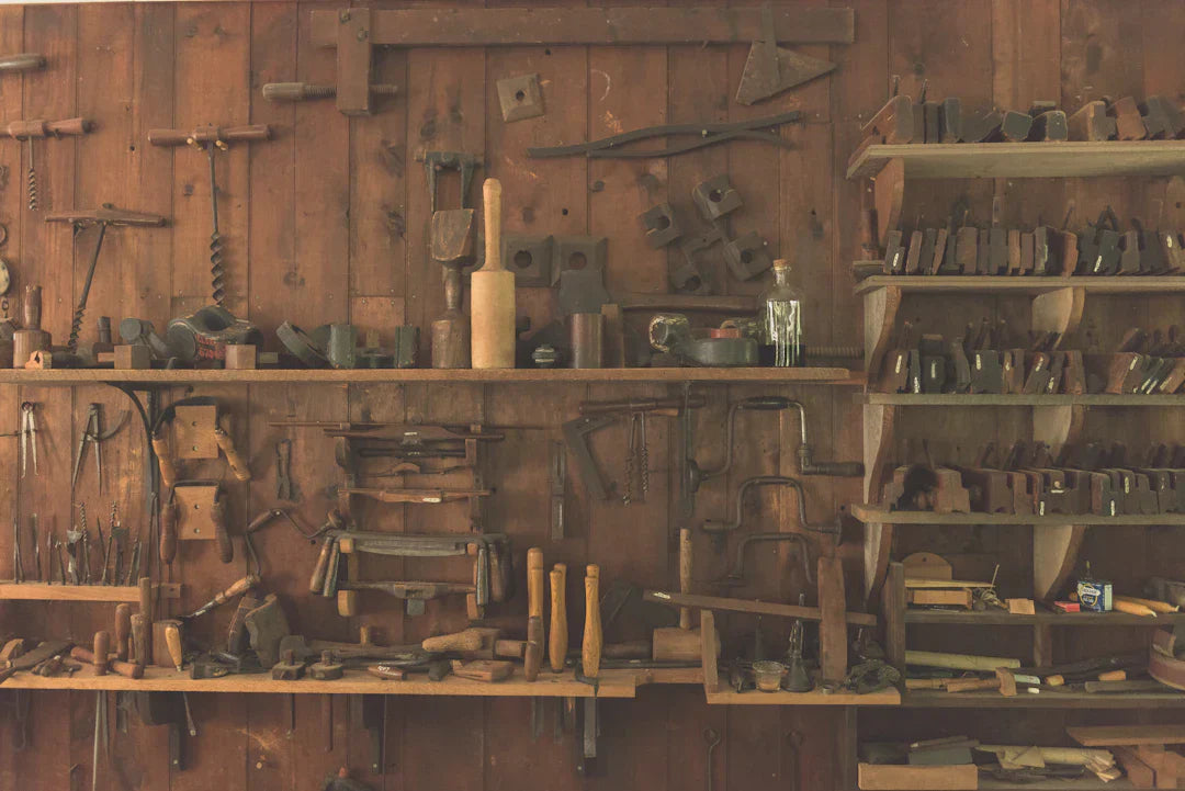 Workshop with hand tools, symbolizing leaders like Frederick Douglass and Thaddeus Stevens during Reconstruction Acts