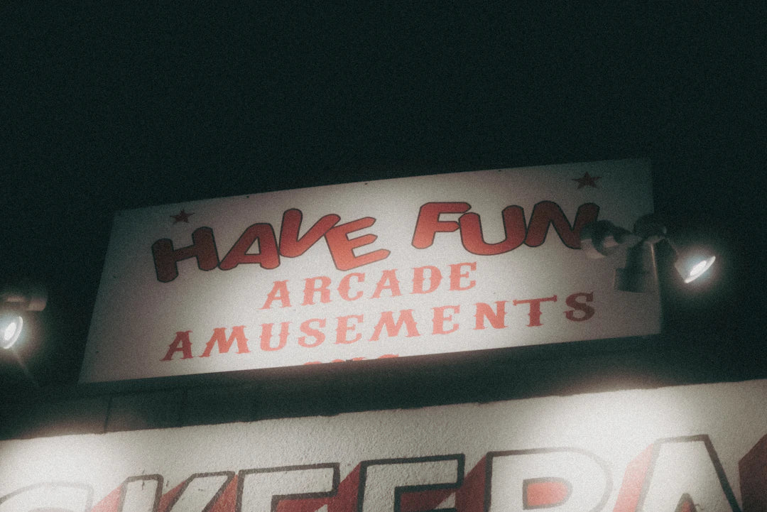 Light-colored arcade sign capturing effective humorous ads and creating emotional connections