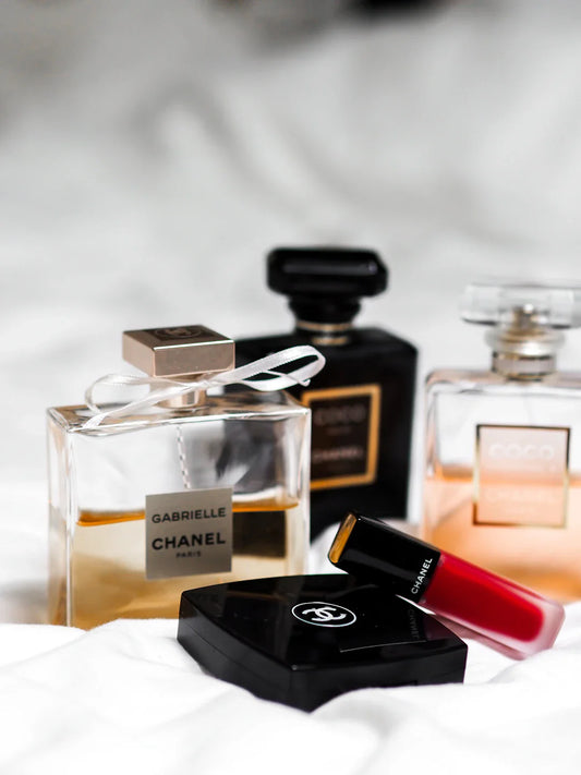 Vintage 1990s cosmetics collection featuring brown lipstick frosted eyeshadow and iconic 90s beauty products from the decade