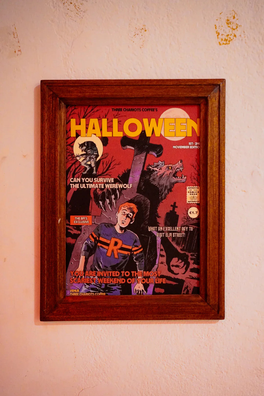 Framed Halloween comic variant cover with werewolves on red background
