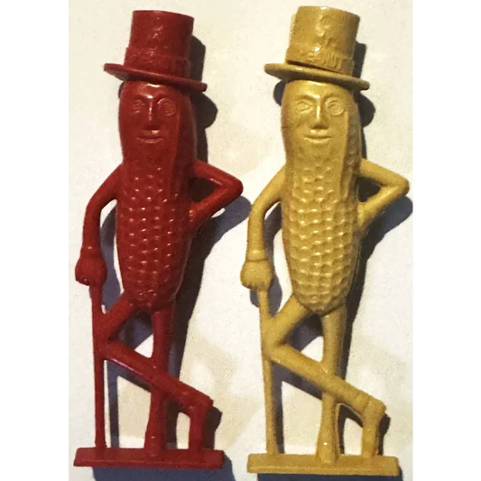 Vintage 1950s Planters Mr. Peanut advertising whistle in red and gold plastic, shaped like the mascot in a top hat