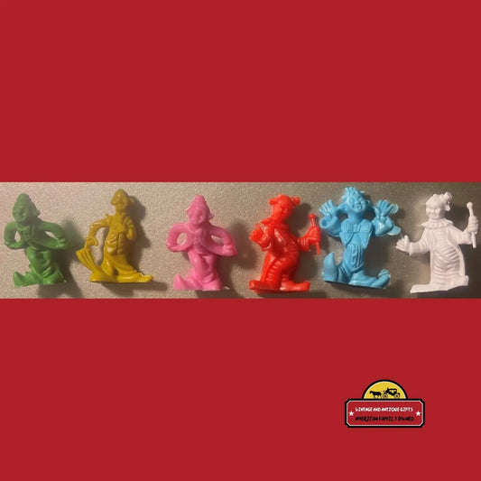 Colorful clown figurines from vintage toy collection add nostalgic charm to home decor