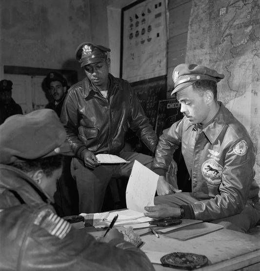 Black leather flight jackets with world war patches on military personnel