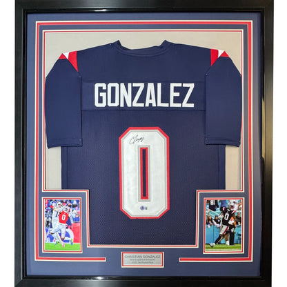 Framed autographed Christian Gonzalez navy blue New England Patriots jersey back