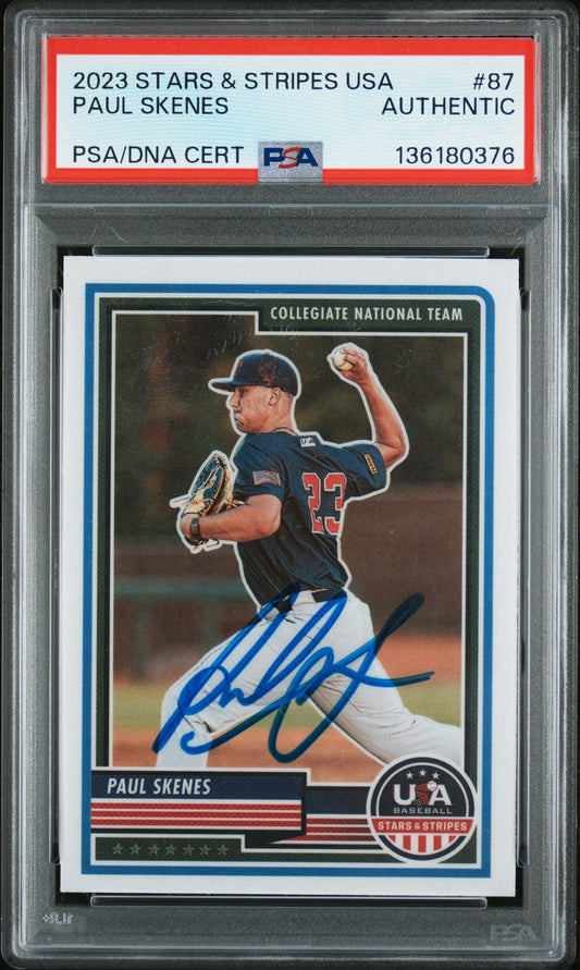 PSA-graded Paul Skenes rookie baseball card in clear holder showing front with blue border, autographed signature, and USA Stars & Stripes logo.