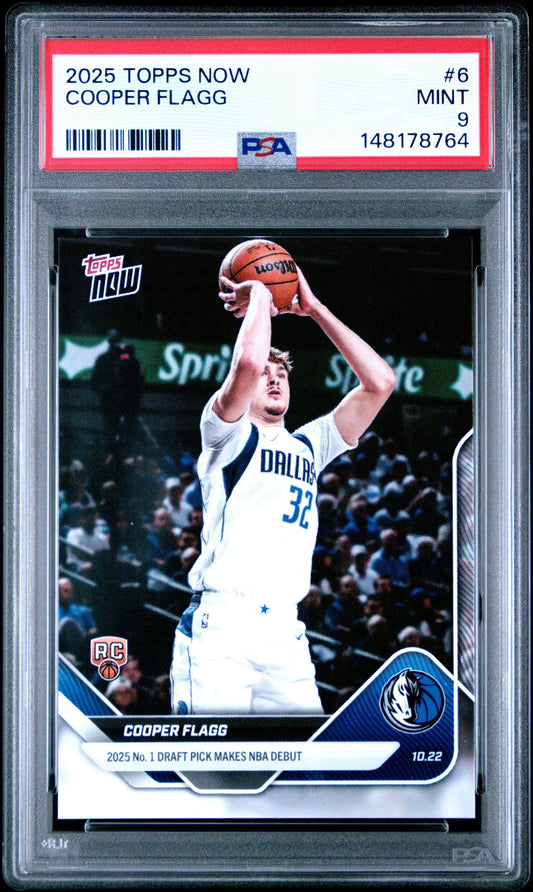 Graded PSA 9 Mint rookie basketball card in clear case showing Cooper Flagg in white Dallas Mavericks uniform shooting basketball.