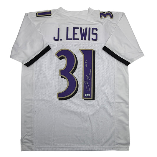 White Baltimore Ravens football jersey number 31 with J. Lewis nameplate and autographed signature on purple number panel, displayed flat front view.