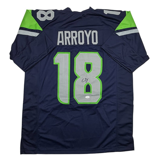 Navy blue football jersey with "ARROYO" and number "18" in green and gray, displayed flat against white background, back view.