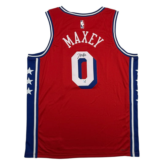 Back view of red Philadelphia 76ers basketball jersey number 0 with "MAXEY" name and autographed signature.