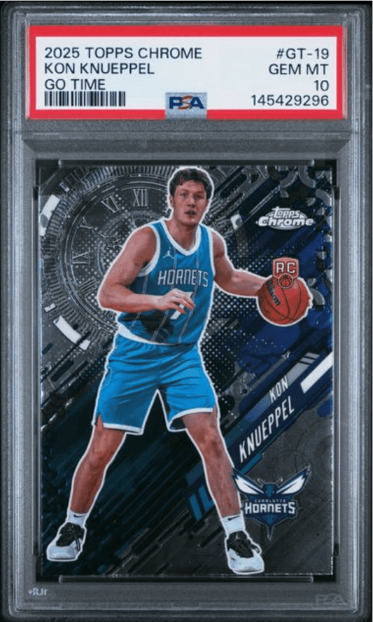 PSA-graded 2025 Topps Chrome Kon Knueppel rookie card in protective case showing player in blue Hornets uniform against dark background.