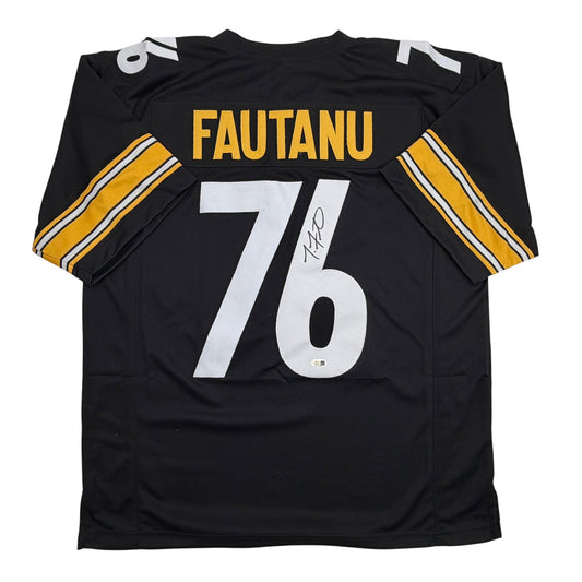 Black Pittsburgh Steelers football jersey displaying "FAUTANU" and number "76" with gold and white striping on sleeves, autographed.