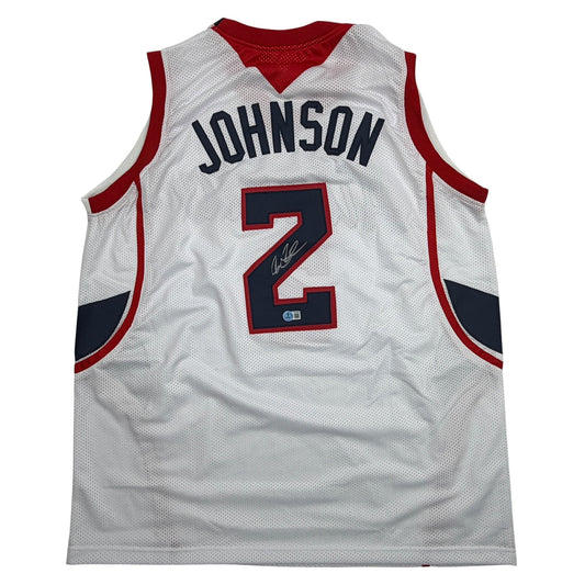 White Atlanta Hawks basketball jersey number 2 with "JOHNSON" nameplate and autographed number, front view.