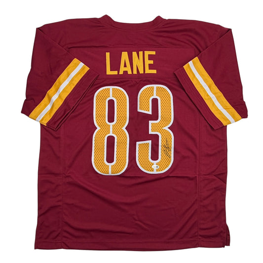 Back view of maroon football jersey with "LANE" and number "83" in gold and white mesh lettering, gold and white striped sleeves.