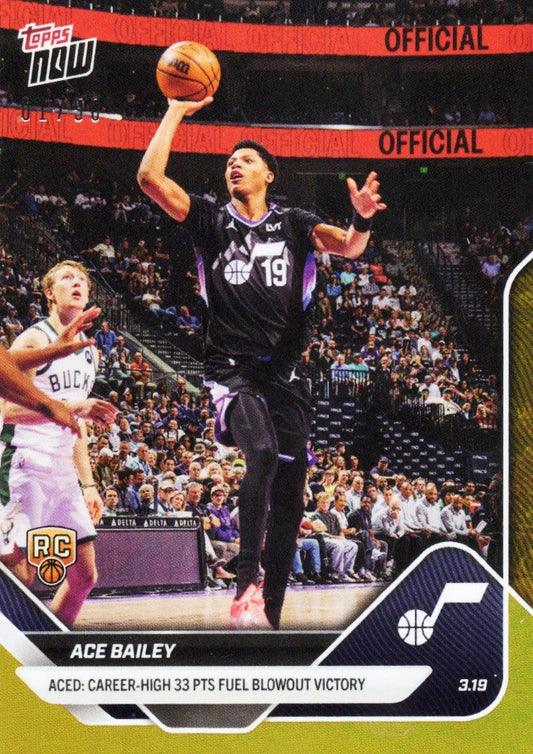 Ace Bailey in Utah Jazz black uniform number 19 shoots basketball over defender in purple jersey during game, Topps Now card with gold foil border and career-high 33 points text.