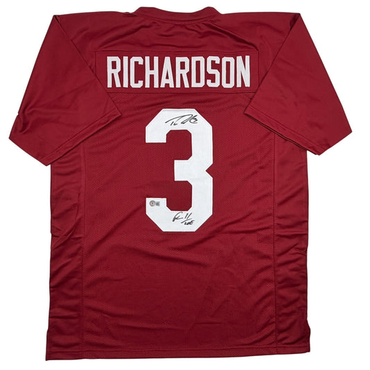 Back view of signed crimson Alabama football jersey number 3 with Richardson nameplate and Beckett authentication sticker.