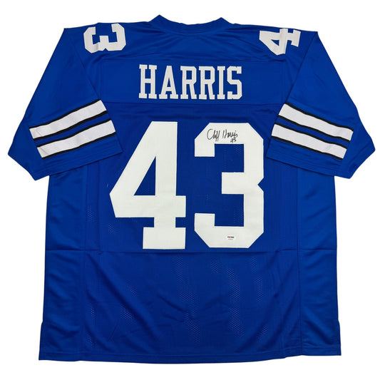 Blue Dallas Cowboys football jersey numbered 43 with Harris nameplate and Cliff Harris autograph, displayed flat against white background.