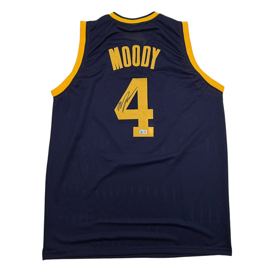 Back view of navy blue basketball jersey with gold trim, "MOODY" and number "4" in gold lettering, signed across the number.