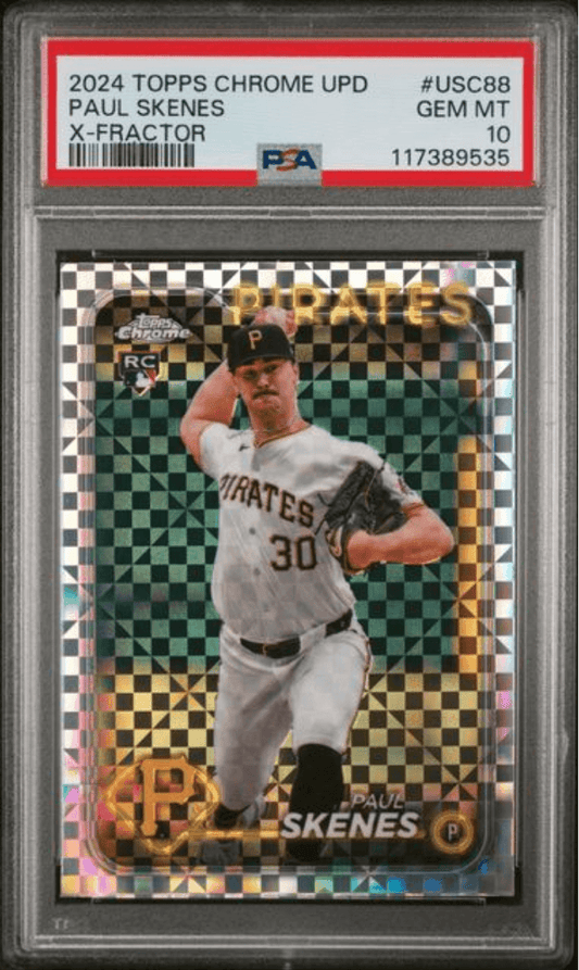 PSA-graded baseball card in clear case displaying Paul Skenes Pirates rookie card with holographic x-factor pattern and red grading label visible.