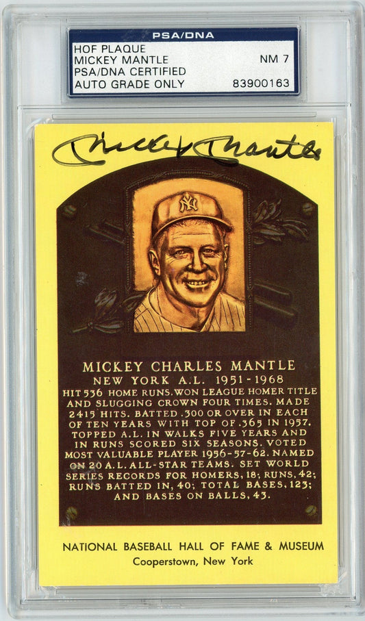 Front view of yellow Hall of Fame plaque with Mickey Mantle's portrait, biographical text, and signed autograph in black ink.