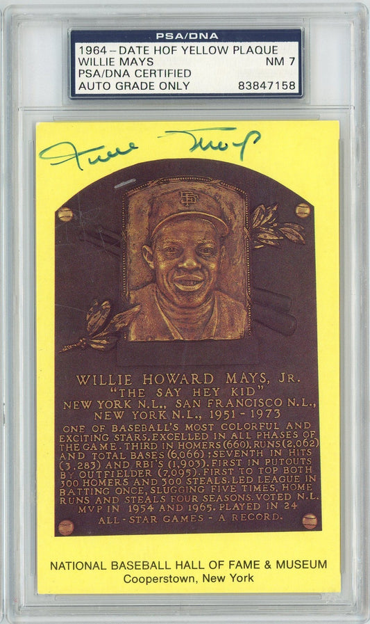Front view of yellow Hall of Fame plaque postcard featuring bronze relief portrait of Willie Mays with printed biographical text and blue PSA/DNA certification label at top.