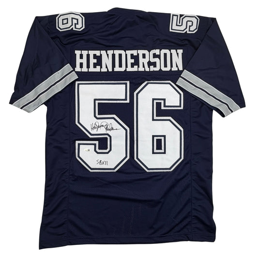 Dark navy blue football jersey displaying "HENDERSON" and number "56" in white with silver trim, laid flat on white background showing back view with visible autograph on jersey.