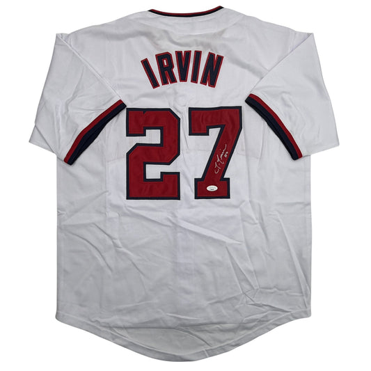Back view of white baseball jersey with "IRVIN" and number "27" in red and navy, featuring an autographed signature on the number.