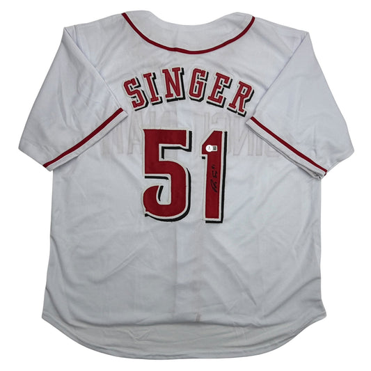 White baseball jersey with red "SINGER" text and number "51" on back, displayed flat against white background.