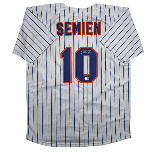 Front view of white pinstriped baseball jersey with "SEMIEN" and number "10" in navy and orange, featuring an autographed signature on the number.