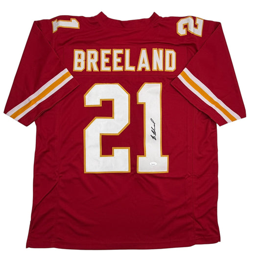 Red Kansas City Chiefs football jersey number 31 with "BREELAND" printed across chest, displayed flat against white background.