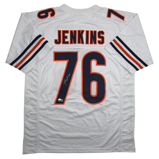 White Chicago Bears football jersey number 76 with "JENKINS" nameplate, displayed flat against white background, showing back view with navy and orange striping on sleeves and autographed number.