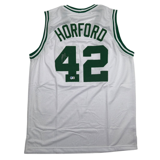 Back view of white mesh basketball jersey with green "HORFORD" text and number "42" featuring an autographed signature.