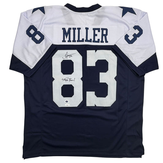 Back view of navy and white football jersey number 83 with "MILLER" nameplate and autographed signatures.