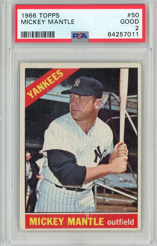 1966 Topps Mickey Mantle baseball card #50 showing player in Yankees uniform holding bat, graded PSA 2 Good with red border and yellow text.