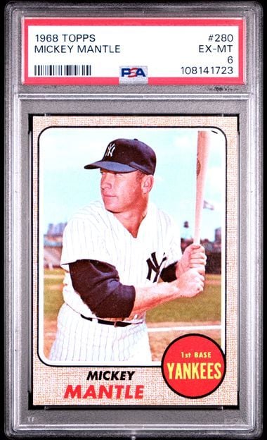 Front of 1968 Topps Mickey Mantle baseball card showing player in Yankees uniform, graded and encased in clear PSA holder.
