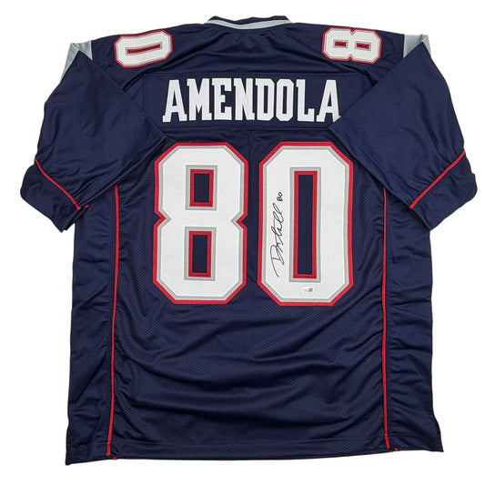 Back view of navy blue football jersey with "AMENDOLA" and number "80" in white and red, featuring autograph and JSA authentication sticker.