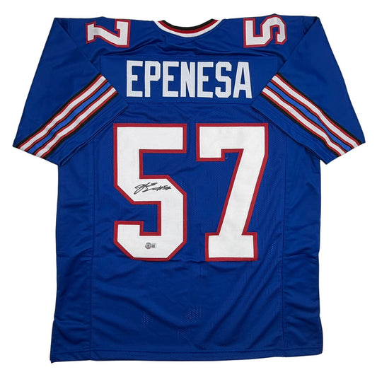 Blue Buffalo Bills football jersey displaying "EPENESA" and number 57 with autographed signature, flat lay view.